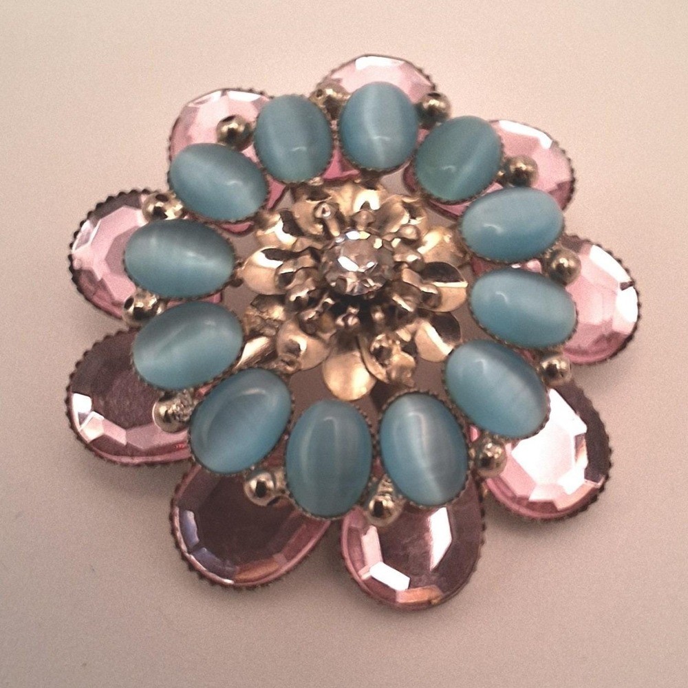 Vintage flower brooch pink rhinestone blue cats eye multi level tone mid century